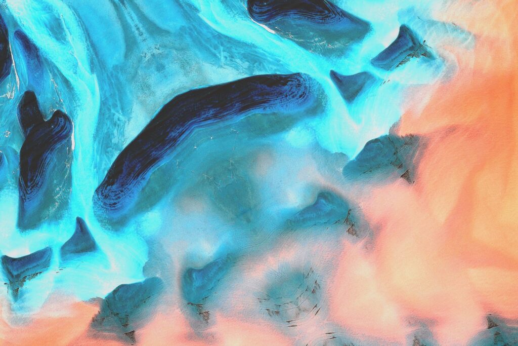 現在の画像: Stunning abstract art featuring dynamic blue and coral colors with fluid patterns.